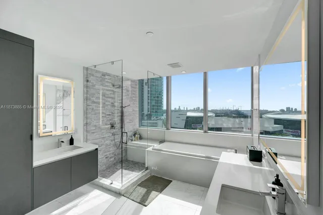 a bathroom with a bathtub and a sink