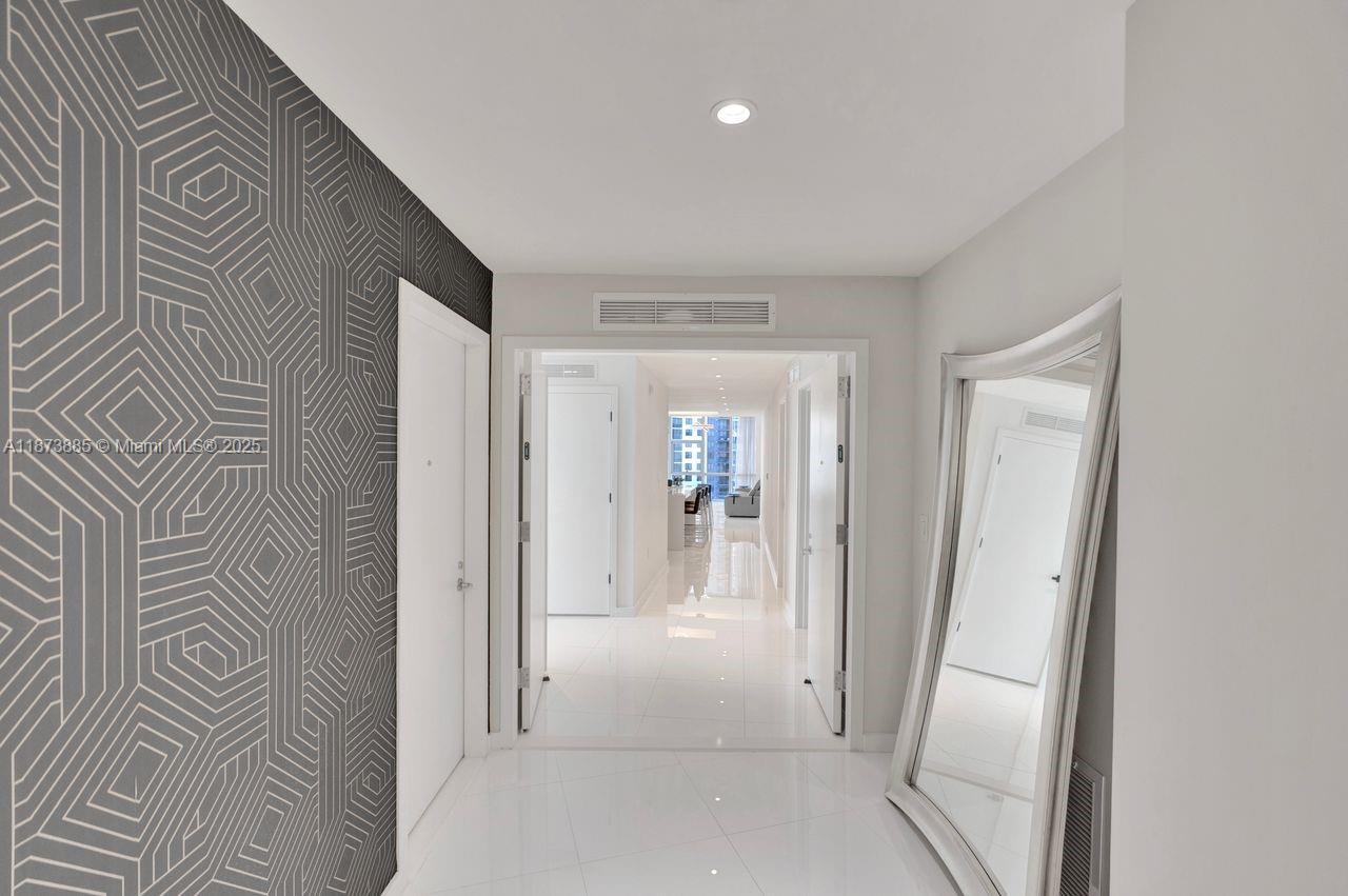 851 Northeast 1st Avenue, Unit 1411 Miami, FL 33132 - Photo 36 of 58 a view of a hallway