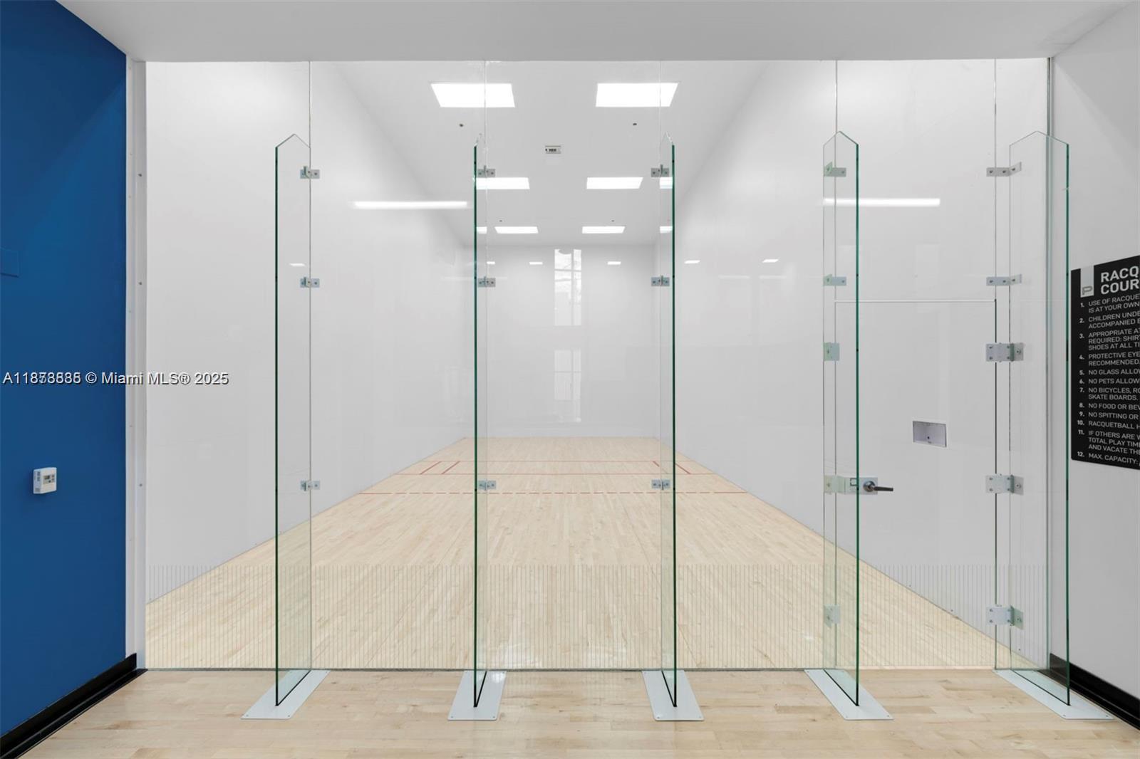 851 Northeast 1st Avenue, Unit 1411 Miami, FL 33132 - Photo 53 of 58 a bathroom with a shower and a glass door