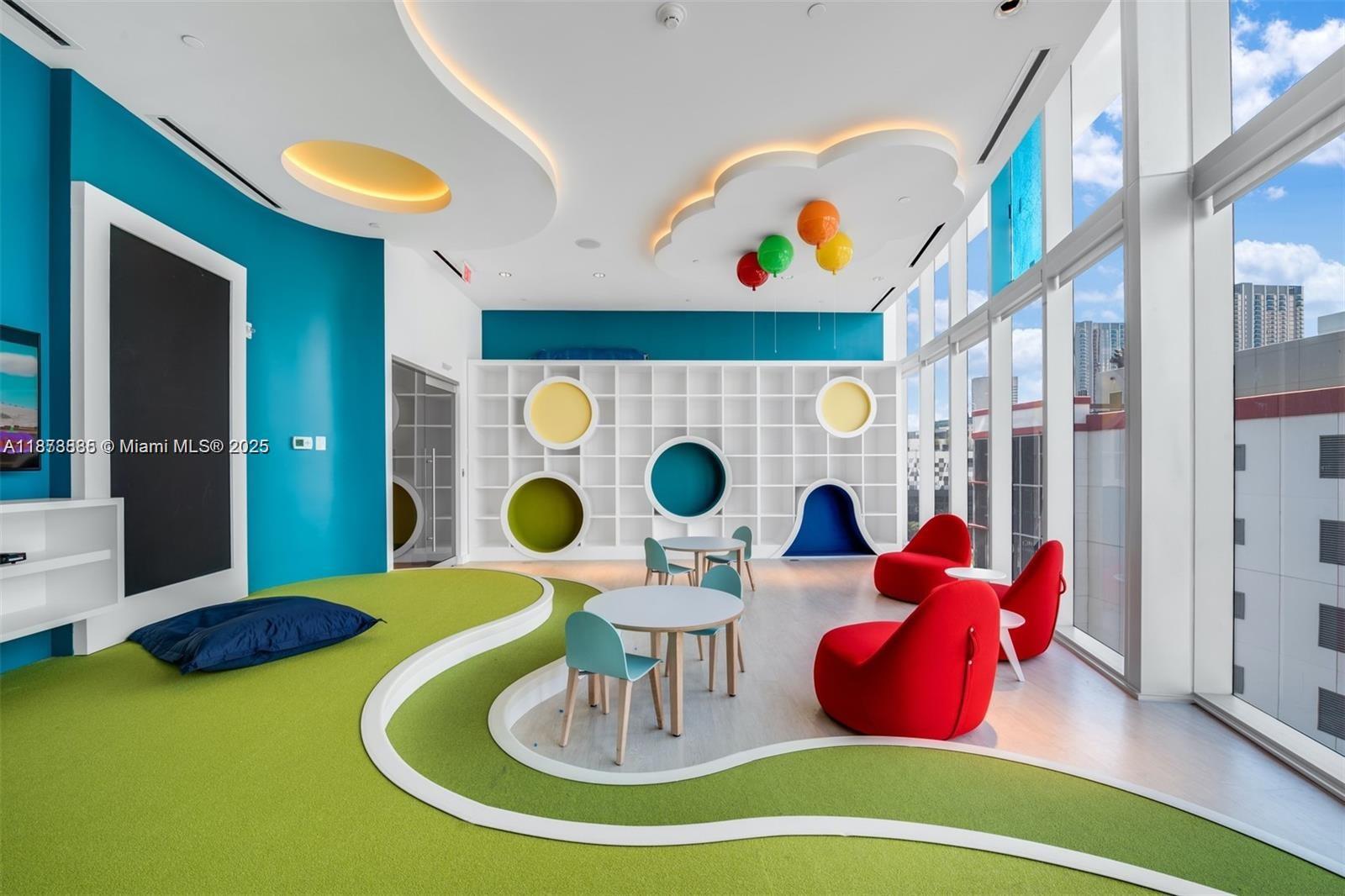 851 Northeast 1st Avenue, Unit 1411 Miami, FL 33132 - Photo 58 of 58 a living room with furniture and a fireplace