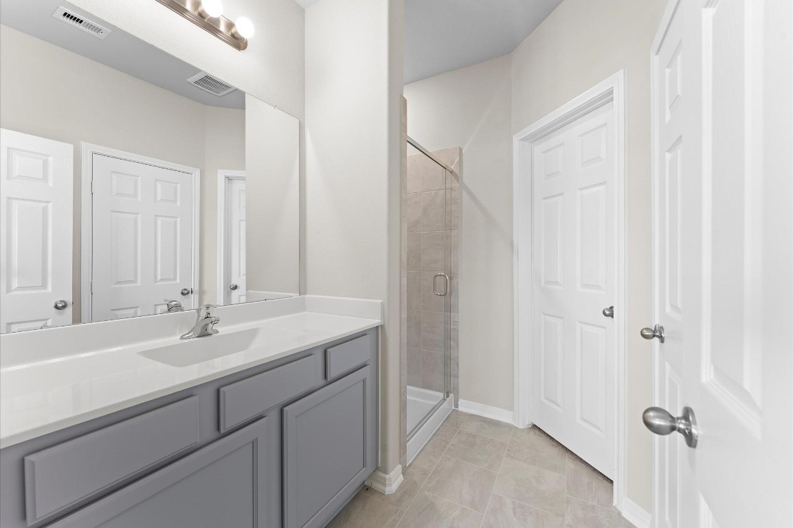1354 Mixander Way La Porte, TX 77571 - Photo 15 of 21 a bathroom with a sink and a mirror