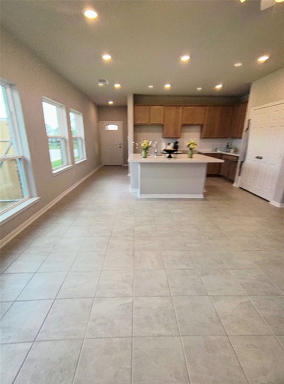 1354 Mixander Way La Porte, TX 77571 - Photo 18 of 21 a view of an empty room with kitchen and window