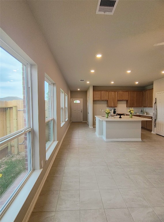 1354 Mixander Way La Porte, TX 77571 - Photo 20 of 21 a view of a kitchen with kitchen island and stainless steel appliances