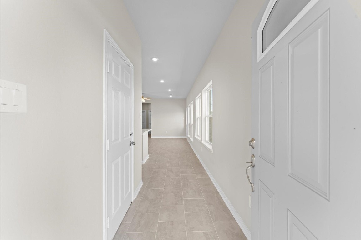 1354 Mixander Way La Porte, TX 77571 - Photo 7 of 21 a view of a hallway with a white walls