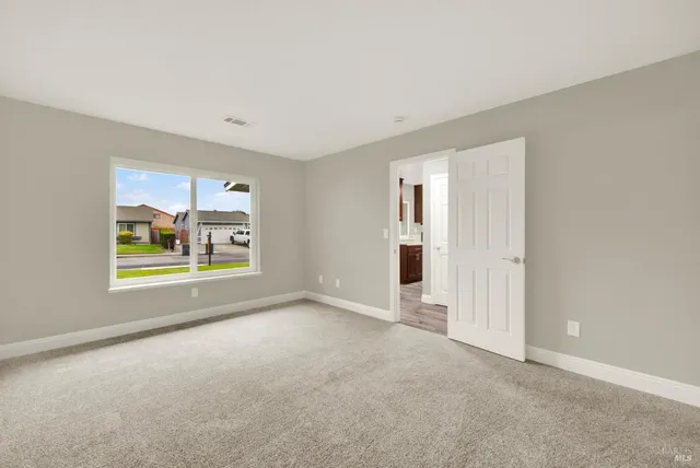 an empty room with windows