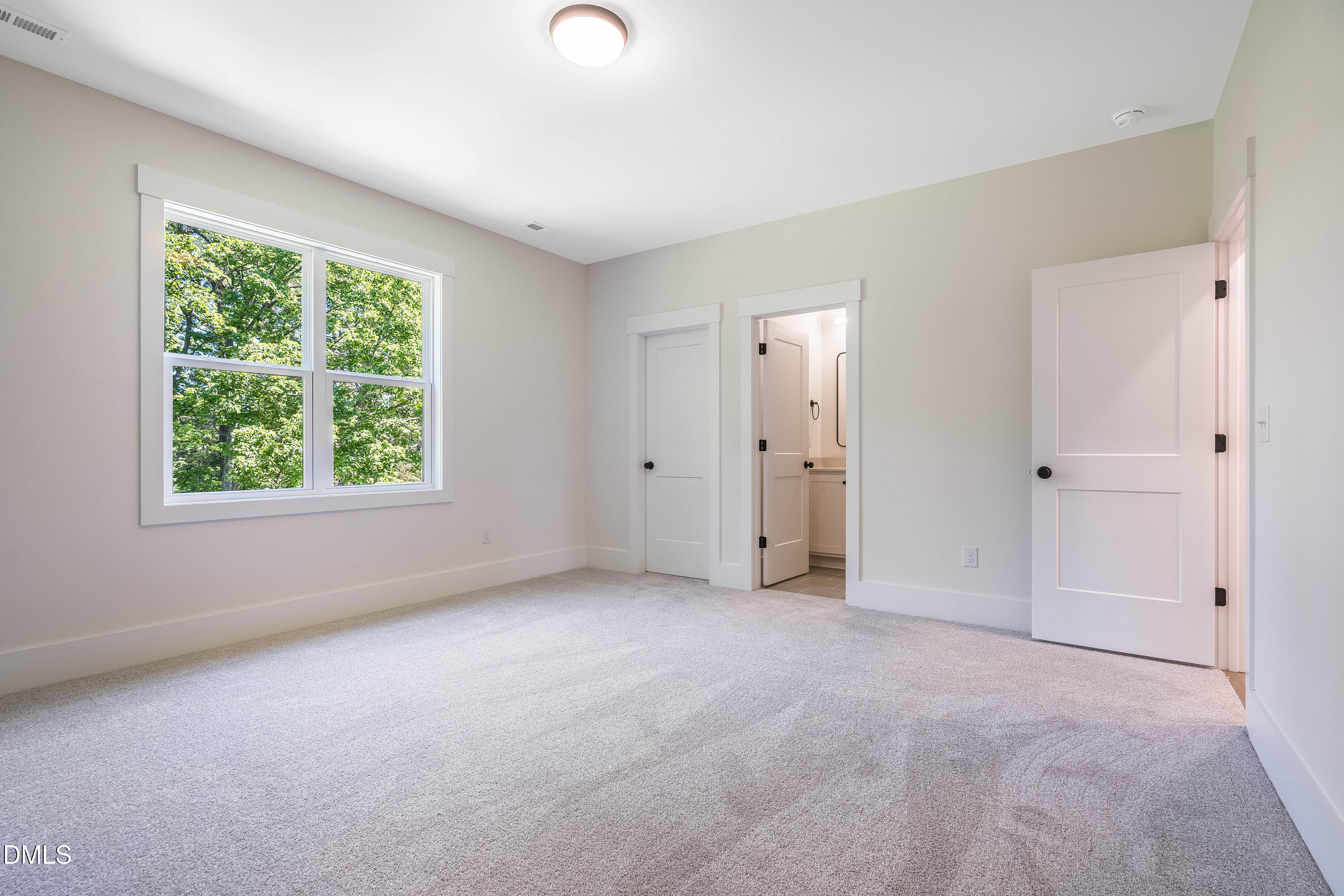 14020 Durant Road Raleigh, NC 27614 - Photo 22 of 86 a view of an empty room with a window