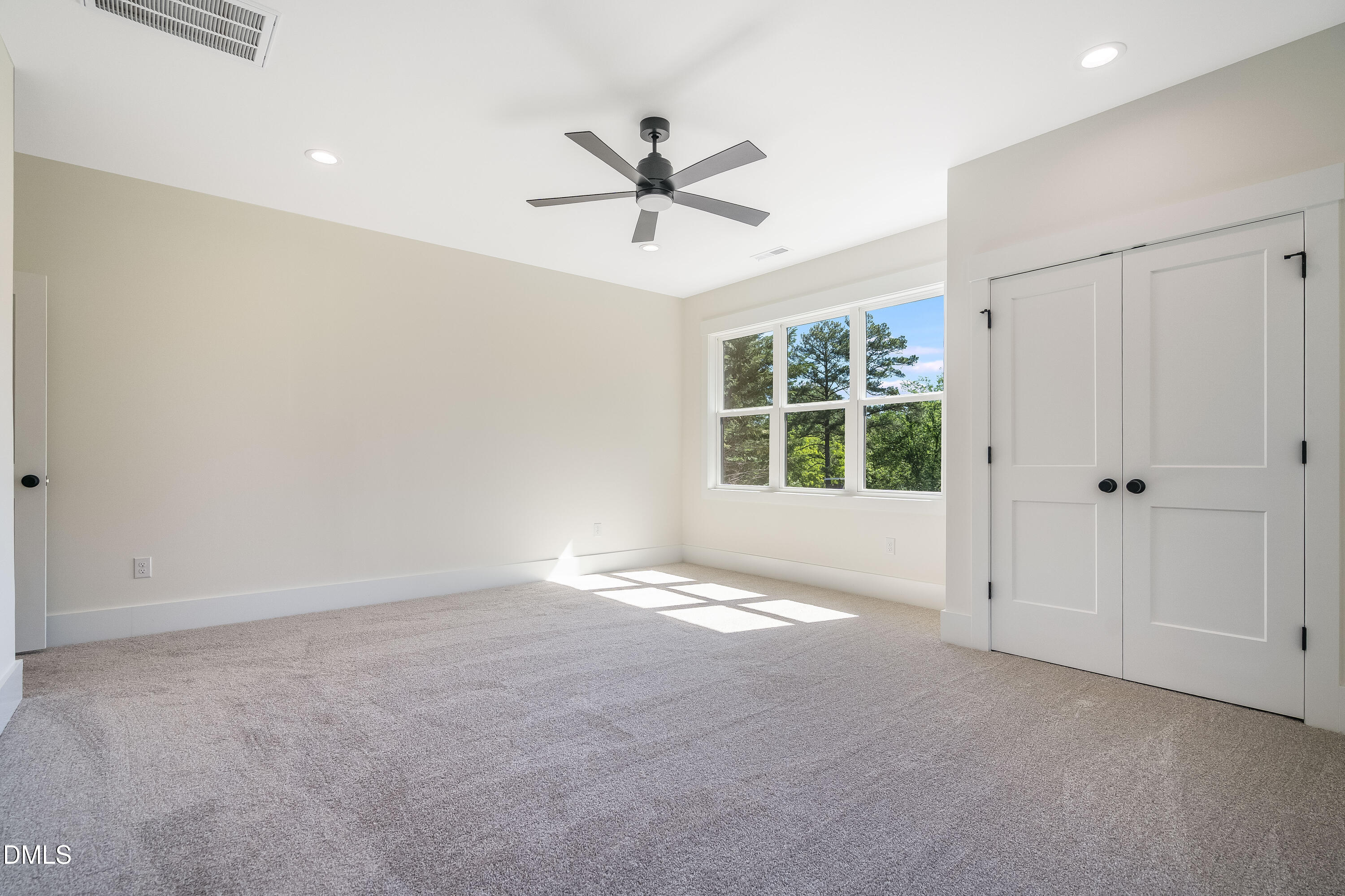 14020 Durant Road Raleigh, NC 27614 - Photo 28 of 86 a view of an empty room with a window