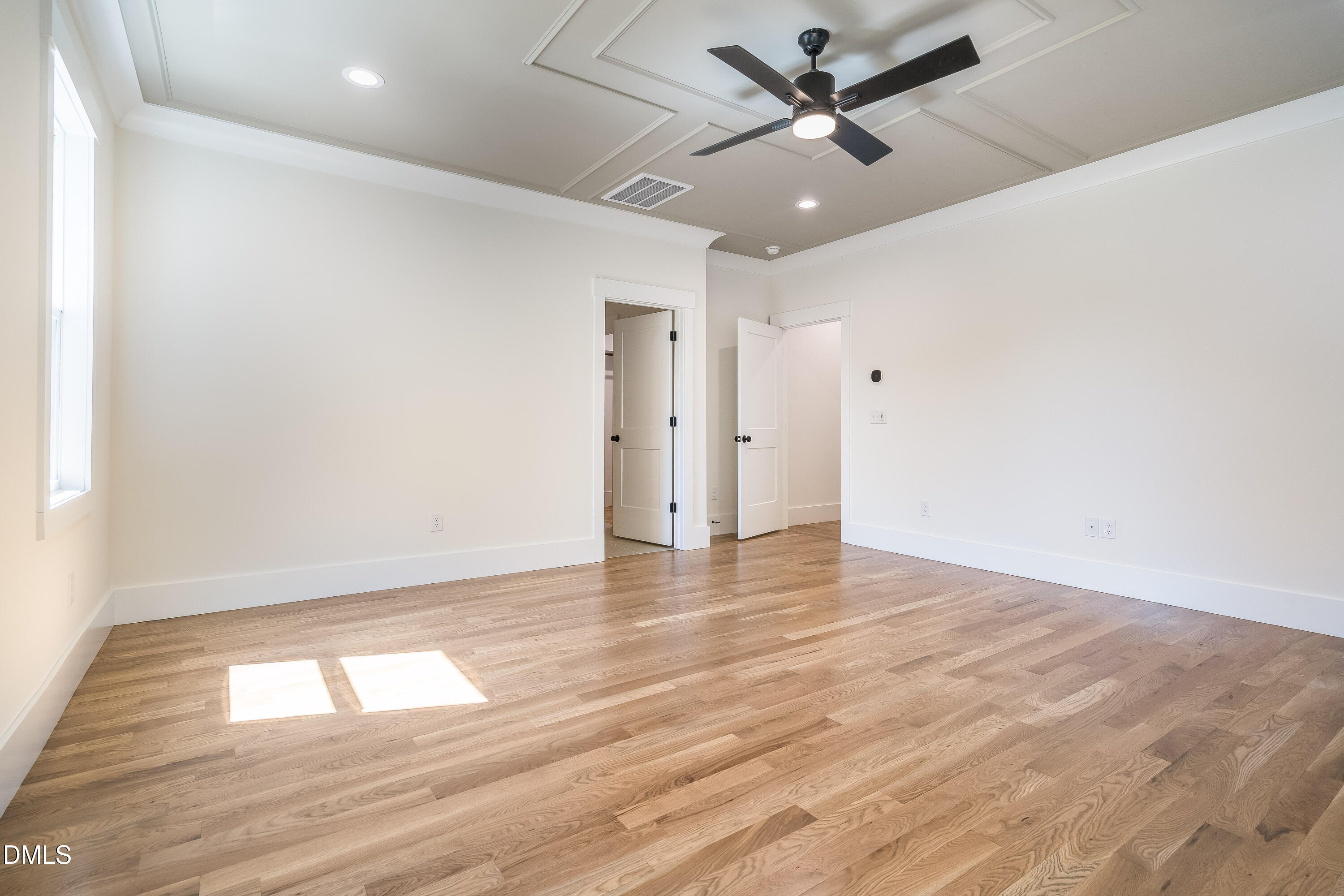 14020 Durant Road Raleigh, NC 27614 - Photo 30 of 86 an empty room with wooden floor and windows