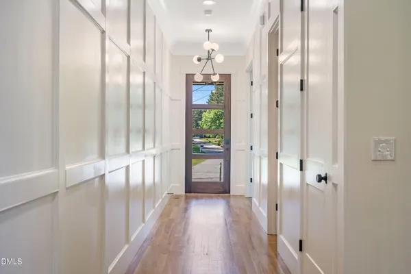 a kitchen with stainless steel appliances a sink and a refrigerator
