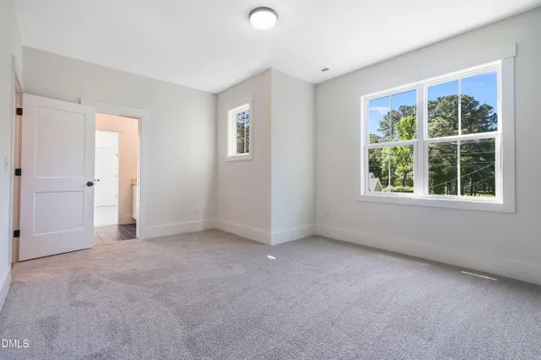 a kitchen with stainless steel appliances a refrigerator and a stove top oven