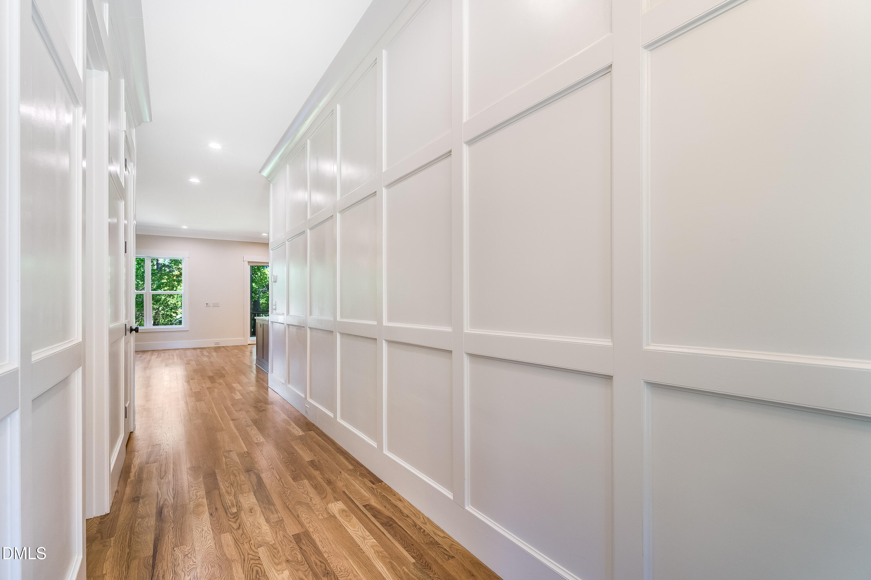 14020 Durant Road Raleigh, NC 27614 - Photo 47 of 86 a view of a hallway with wooden floor