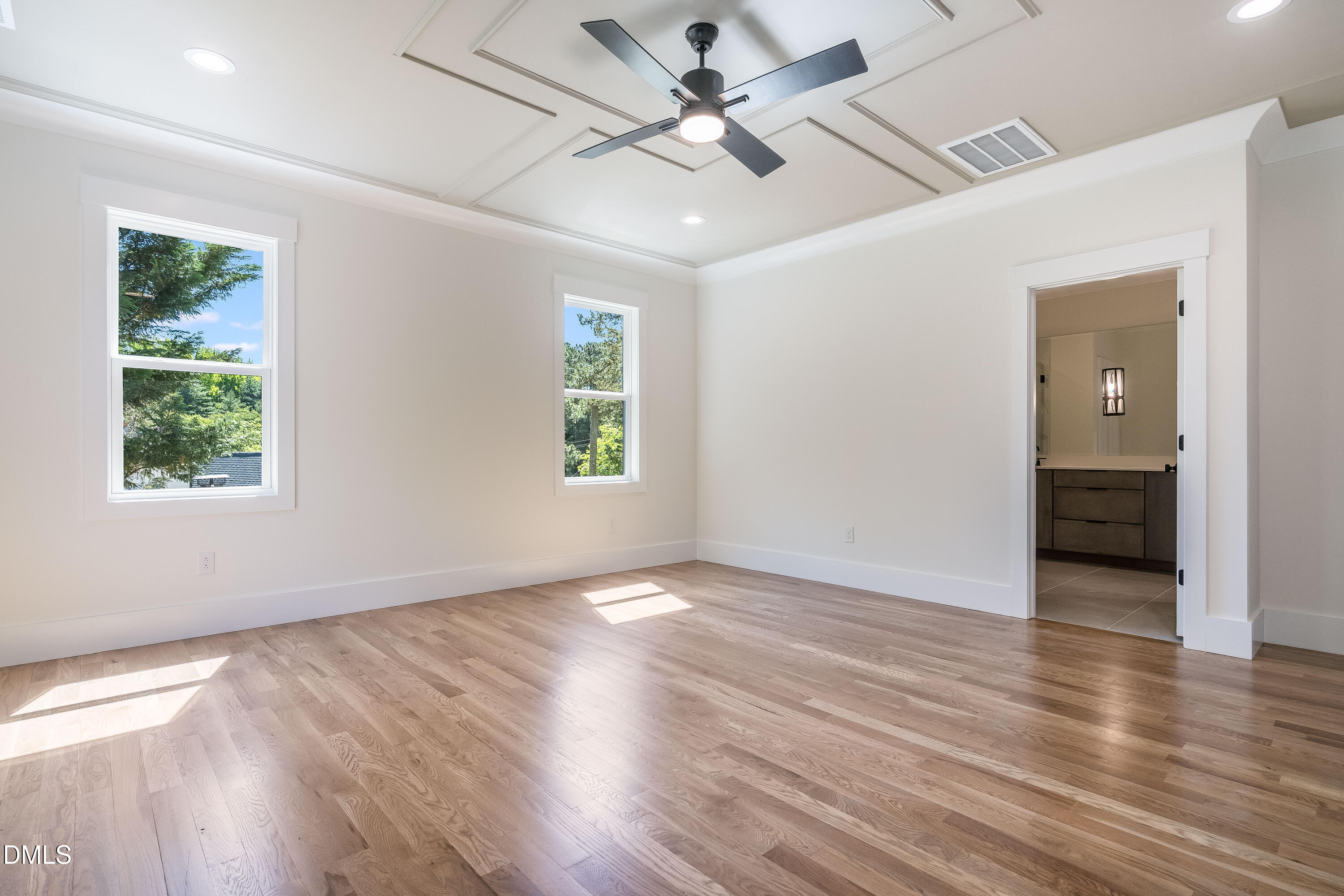 14020 Durant Road Raleigh, NC 27614 - Photo 73 of 86 a view of an empty room with window and wooden floor