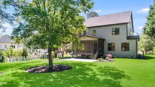 a view of a balcony with wooden floor