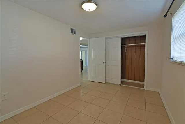 an empty room with window