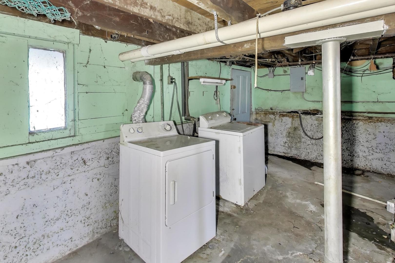 2023 North Kedvale Avenue Chicago, IL 60639 - Photo 12 of 18 a utility room with dryer and washer