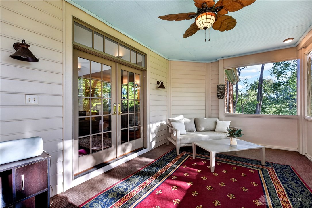 330 South Alpha Bellbrook Road Bellbrook, OH 45305 - Photo 25 of 87 This inviting porch offers tranquil views, perfect for relaxation and enjoying the natural surroundings.