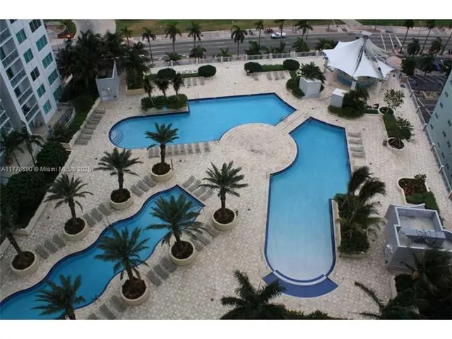 a picture of table and chairs in the patio