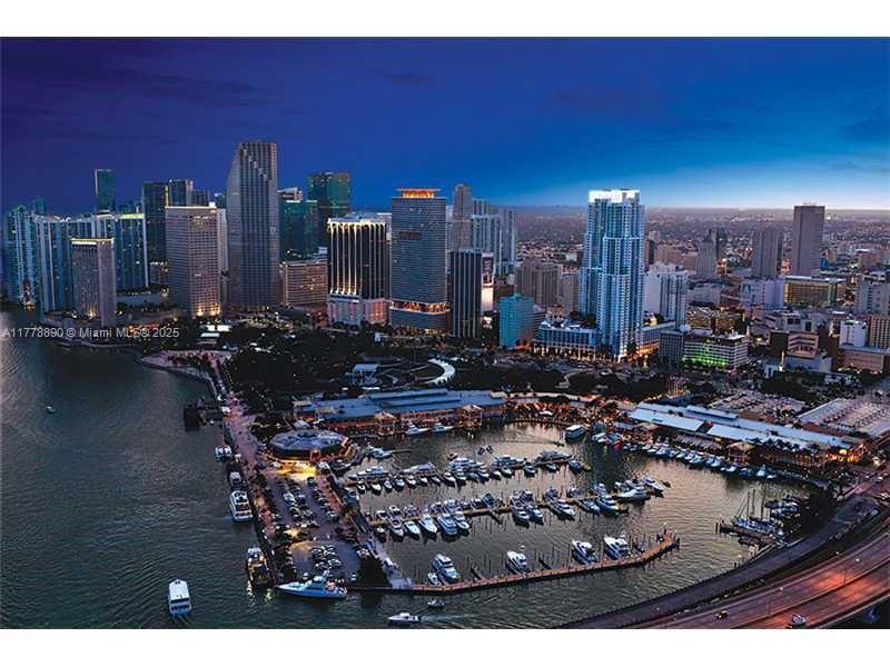 244 Biscayne Boulevard, Unit 250 Miami, FL 33132 - Photo 8 of 8 a view of a city with tall buildings
