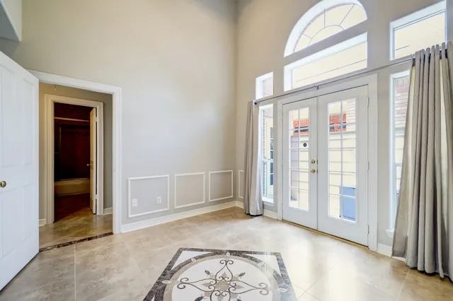 an empty room with windows