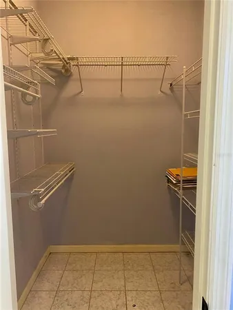 a view of a room with racks on the wall