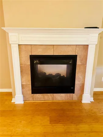 a living room with a fireplace