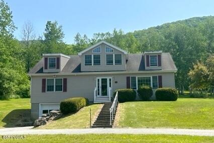 452 Pattison Road North Adams, MA 01247 - Photo 1 of 28 a front view of a house with a yard