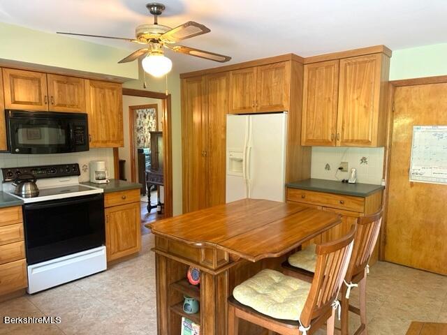 452 Pattison Road North Adams, MA 01247 - Photo 6 of 28 a kitchen with stainless steel appliances a stove a sink and a refrigerator