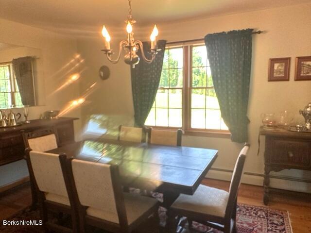 452 Pattison Road North Adams, MA 01247 - Photo 8 of 28 a view of a dining room with furniture and chandelier