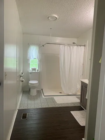 a bathroom with a sink and a toilet