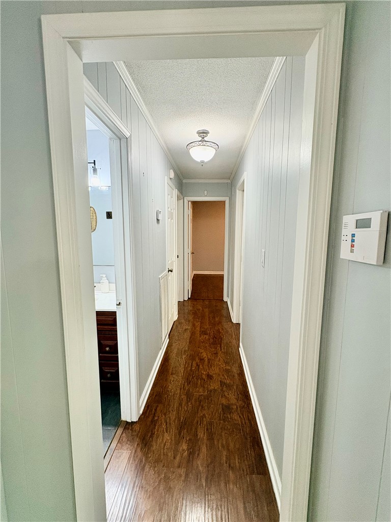 516 Carole Avenue Anderson, SC 29625 - Photo 13 of 34 This central hallway connects various living spaces with classic design.