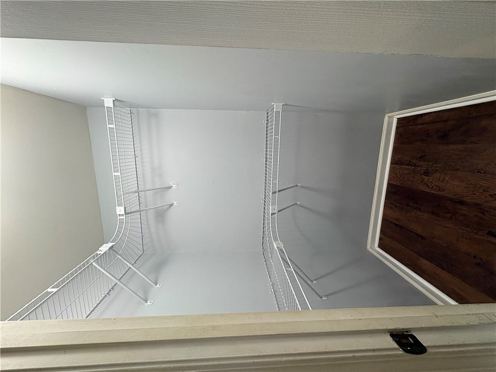 516 Carole Avenue Anderson, SC 29625 - Photo 23 of 34 This spacious closet offers ample storage with convenient wire shelving and a rich wood-look floor.