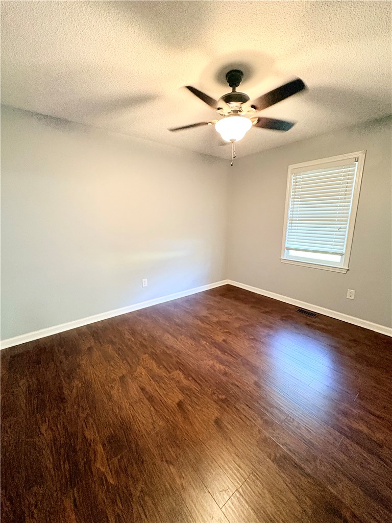 516 Carole Avenue Anderson, SC 29625 - Photo 27 of 34 This spacious room features rich wood flooring and abundant natural light.