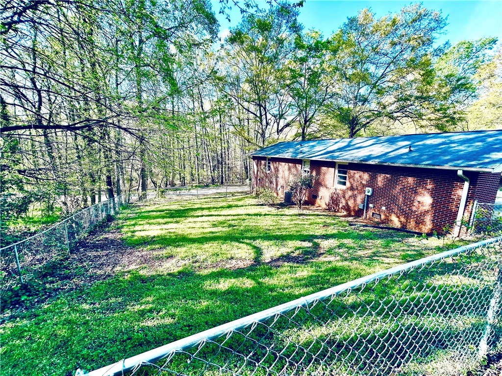 516 Carole Avenue Anderson, SC 29625 - Photo 32 of 34 This private yard offers serene views and ample space for outdoor enjoyment.