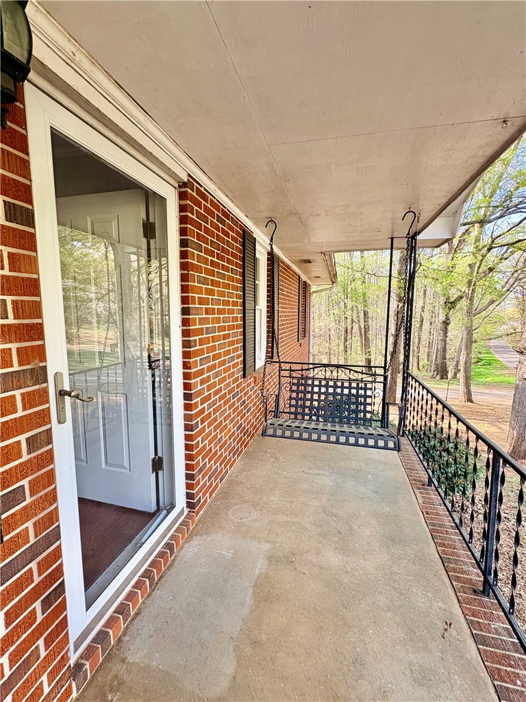 516 Carole Avenue Anderson, SC 29625 - Photo 4 of 34 This inviting porch offers a tranquil retreat for enjoying the outdoors.