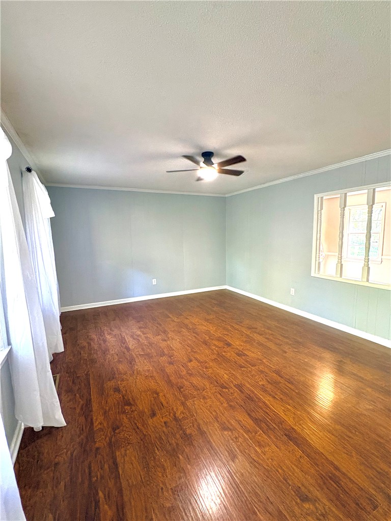 516 Carole Avenue Anderson, SC 29625 - Photo 5 of 34 This bright space features rich flooring, creating an inviting atmosphere.