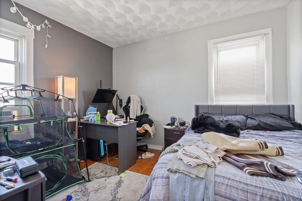 84 Cory Street Fall River, MA 02720 - Photo 20 of 36 a bedroom with furniture and a window