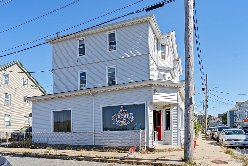 84 Cory Street Fall River, MA 02720 - Photo 2 of 36 a front view of a building with street