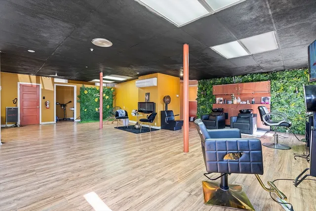 a view of a patio with a table chairs and a patio