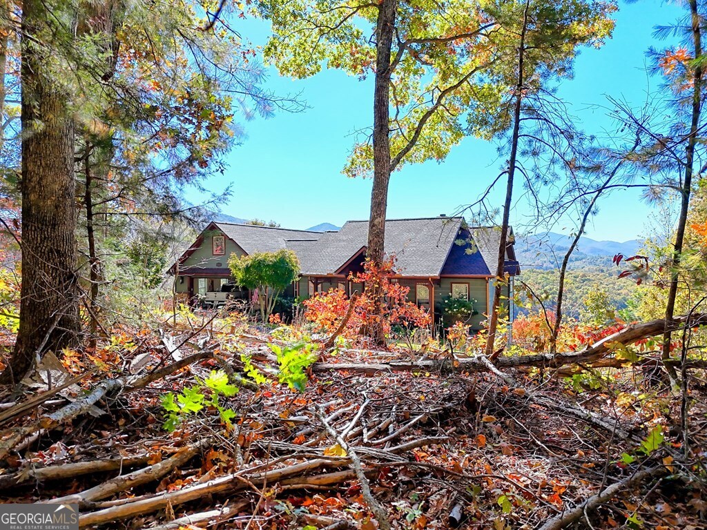 20 Victoria Wds Circle Hiawassee, GA 30546 - Photo 8 of 17 a view of a house with a yard and sitting area