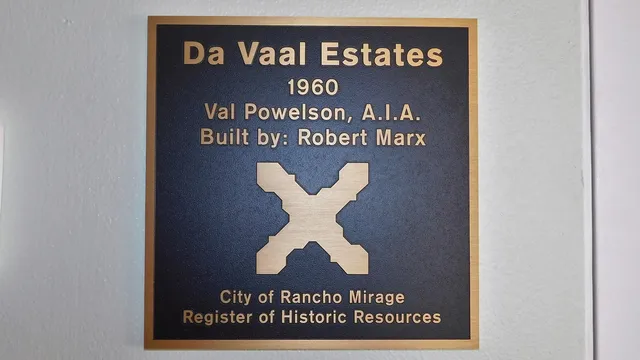 a sign that is on top of a wall