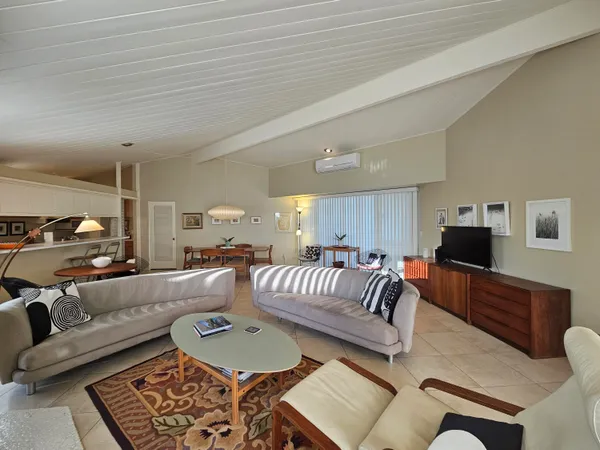 a kitchen with stainless steel appliances granite countertop a stove sink and refrigerator