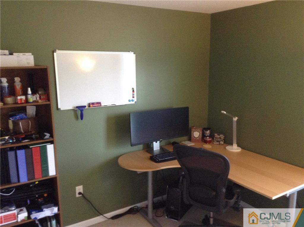 1808 Ridgeview Court Sayreville, NJ 08859 - Photo 5 of 15 a workspace with furniture pool table and a projector screen