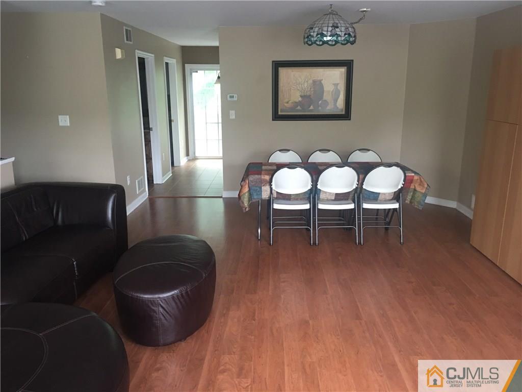 1808 Ridgeview Court Sayreville, NJ 08859 - Photo 6 of 15 a living room with furniture and a wooden floor