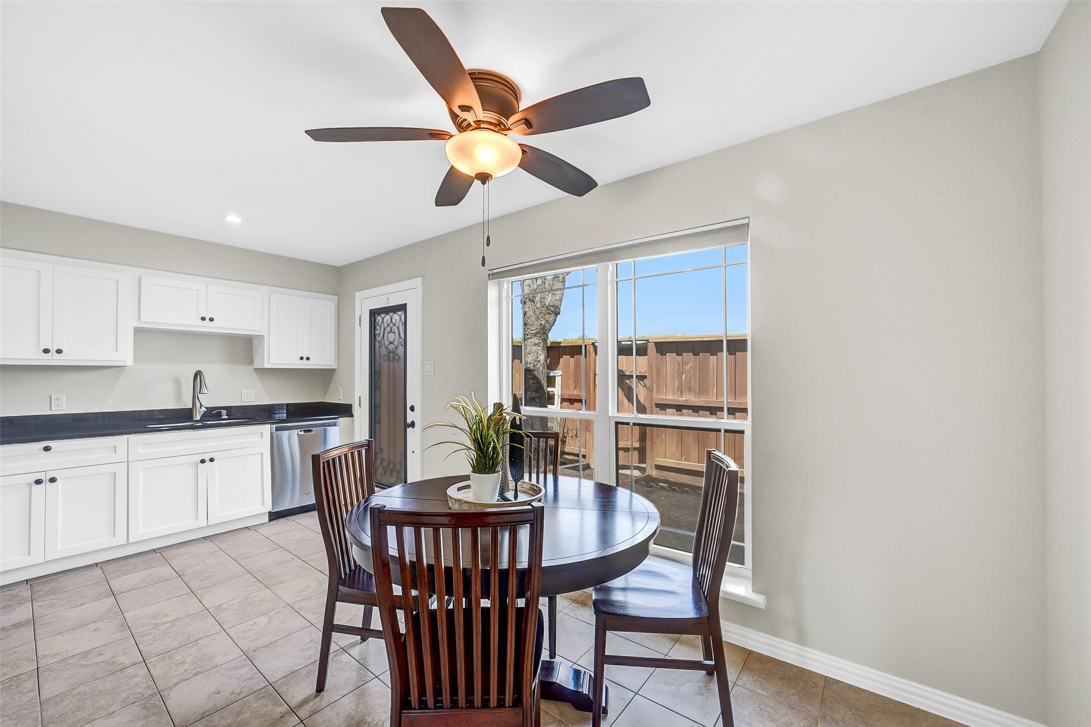 6531 Wanda Lane Houston, TX 77074 - Photo 12 of 29 a view of a dining room with furniture and wooden floor
