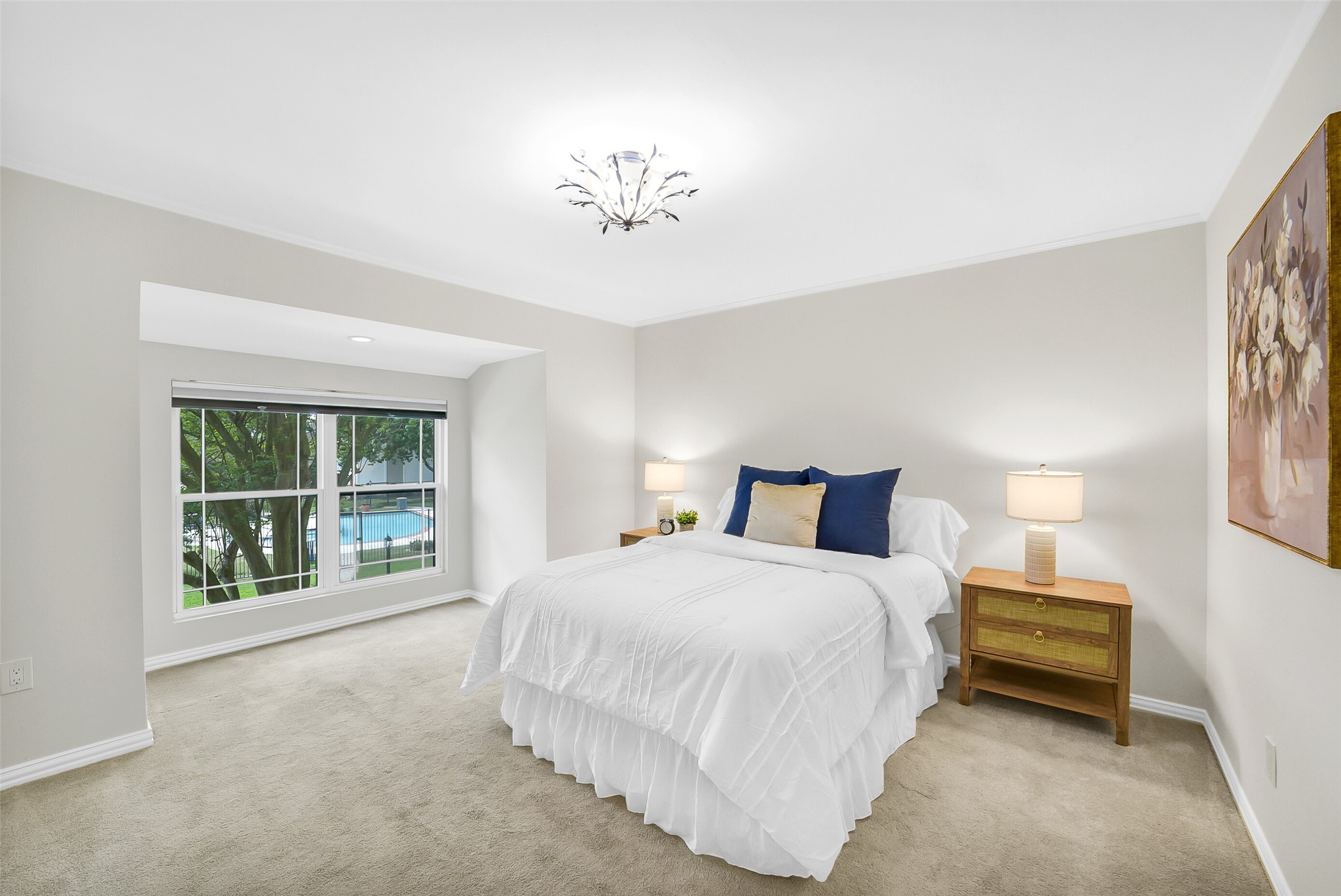 6531 Wanda Lane Houston, TX 77074 - Photo 16 of 29 a spacious bedroom with a bed and a large window