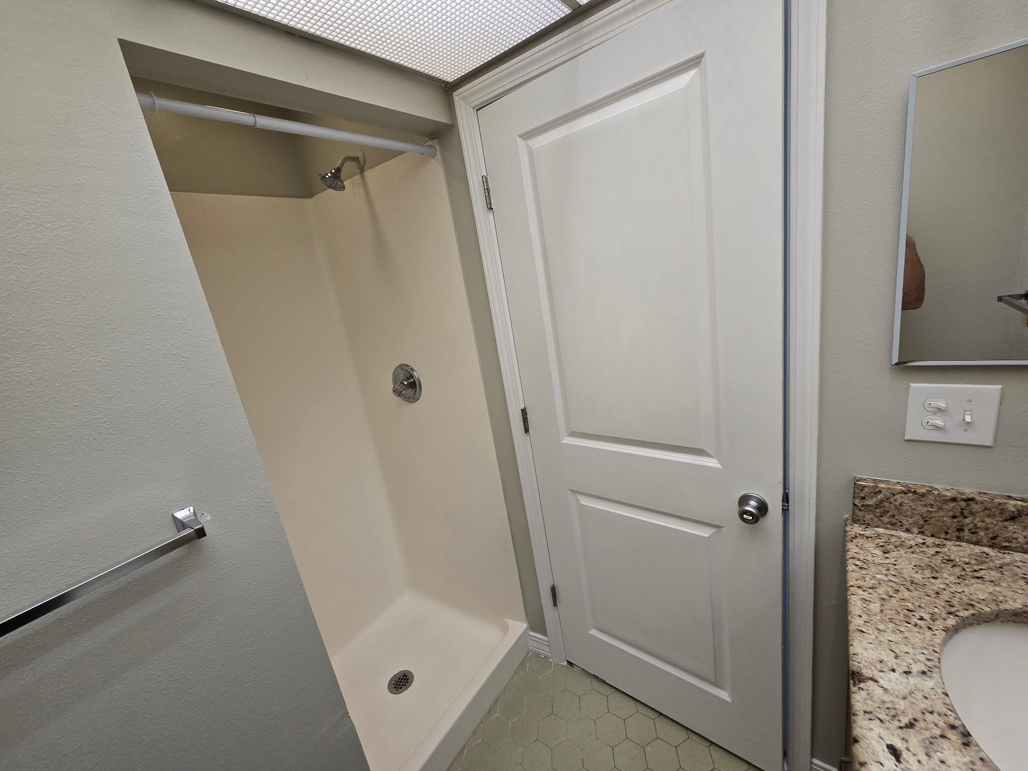 125 Rio Del Mar Street, Unit B St. Augustine, FL 32080 - Photo 17 of 17 Full bathroom featuring vanity and a stall shower