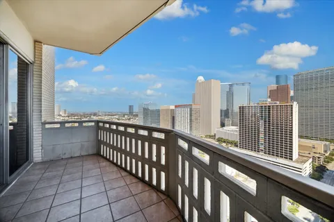 a view of city from a balcony