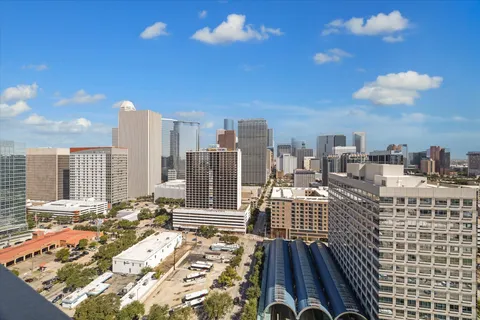 a view of a balcony with city view