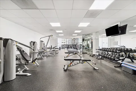a view of a room with gym equipment