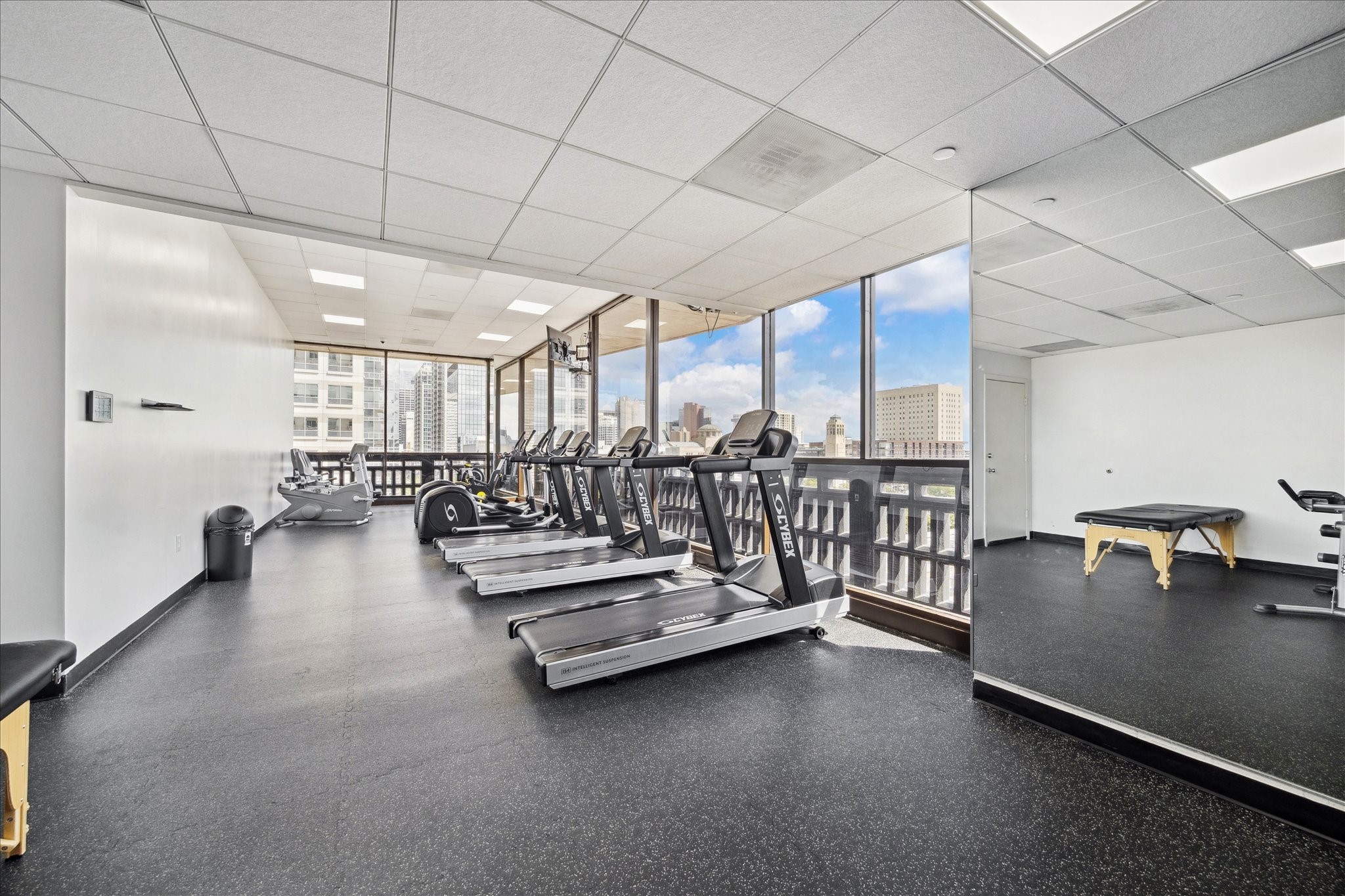 2016 Main Street, Unit 2417 Houston, TX 77002 - Photo 20 of 40 a lobby with furniture and stairs